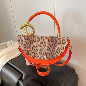 Fashionable leopard print half-moon handbag in bright orange with golden spiral handle