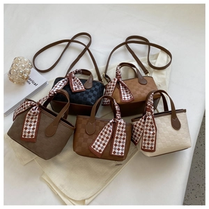 Collection of plaid textured crossbody bags in five colors with decorative silk scarves