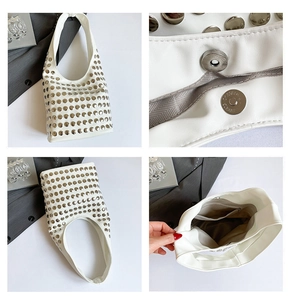 Détails d'un sac à main blanc à rivets avec fermoir magnétique et espace de rangement