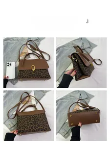 Detail view of leopard print handbag with gold U-shaped lock and four-grid perspective