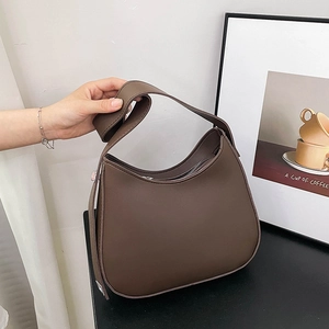 Minimalist dark brown leather hobo shoulder bag with wide strap for trendy commuting