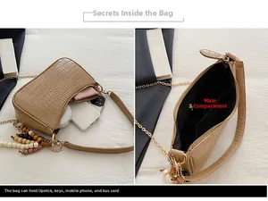 Detail of khaki crocodile pattern bag showing spacious interior with beads chain