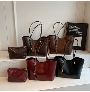 Detailed set of retro polished leather tote bags with matching pouches in four classic colors