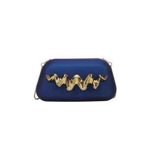 Modern navy blue evening clutch with golden wave metal trim and slim chain strap