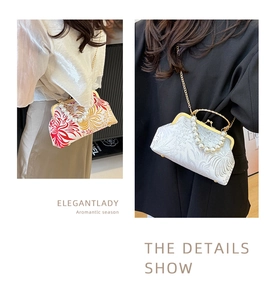 Detail of vintage floral clutch bags with large pearl handle and metal chain straps