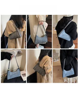 Sac sous le bras croissant orné de clous, présenté sous plusieurs angles stylés