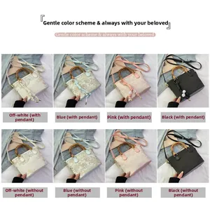 Grid display of embroidered bucket bags in four colors with bamboo handles and scenic motifs