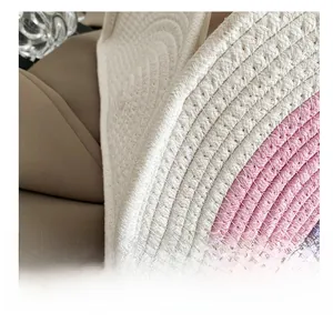 Macro shot of high-quality woven edge details on rainbow cotton rope beach bag