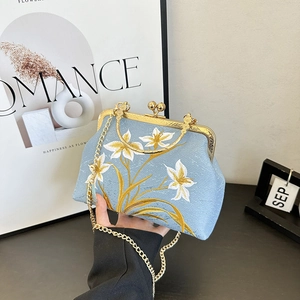 Vintage light blue embroidered floral handbag with gold chain strap and bead clasp