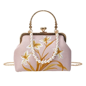 Vintage pink embroidered evening bag with pearl handle and golden chain strap for women