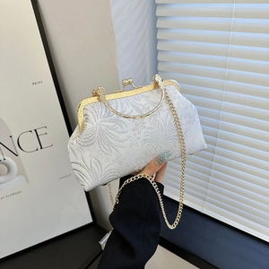 Elegant white floral jacquard handbag with gold chain strap and vintage metal clasp