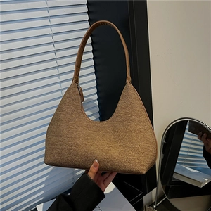 Retro brown woven hobo bag with crescent shape and leather shoulder strap for women