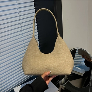Minimalist beige woven hobo shoulder bag for women with summer vacation style