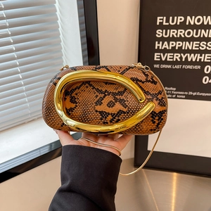 Brown snake print acrylic clutch with bold gold metal handle and chain strap for women