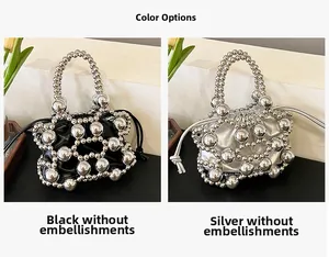 Detail of beaded drawstring bucket bags in metallic black and silver finishes