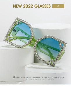 Macro detail of luxury green transparent square frames with encrusted rhinestones