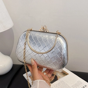 Silver quilted evening clutch bag with crystal clasp and chain strap for parties