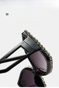 Close-up of sparkling rhinestones on lightweight square purple lens oversized sunglasses