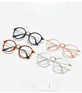 Retro round anti-blue light glasses frames in black tortoise and transparent colors