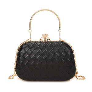Elegant black woven evening bag with gold ring handle and crystal clasp on white background