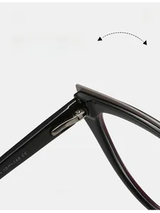 Detailed macro view of durable metal hinges on glossy black cat-eye TR90 frames