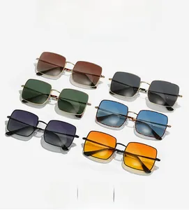 Close-up of stylish square metal sunglasses in various gradient lens colors