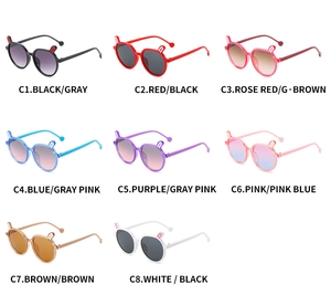 Grid view of kids rabbit ear sunglasses in eight candy colors with gradient lenses