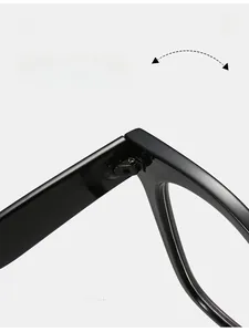 Close-up of durable high-strength metal hinges on black square frame glasses