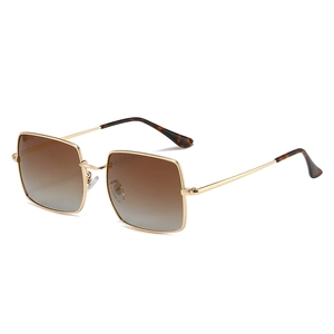 Chic oversized square polarized sunglasses with golden metal frame and gradient brown lenses