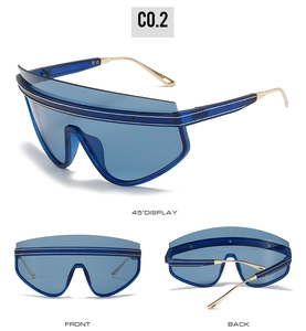 Three-view display of oversized shield sunglasses with blue lenses and gold metal temples