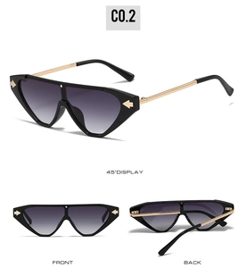 Detailed views of geometric cat eye sunglasses with gold arrow accents and gradient lenses