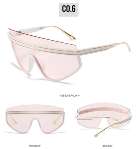 Detail view showing white frame oversized sunglasses with pink lenses and gold metal temples