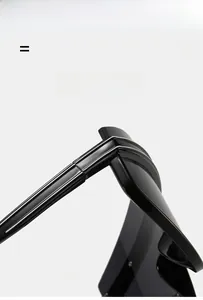 Close-up of the durable hinge and silver line decor on these oversized black sunglasses