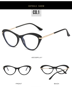 Detail view of small cat-eye optical frames with golden metal accents on the temple