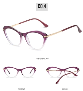 Detail view of cat eye glasses with purple gradient frame and golden metal temples