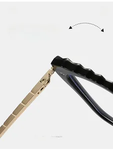 Macro view of durable gold metal hinge on black TR90 cat-eye glasses frames