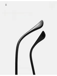 Detail of curved TR90 glasses legs showing ergonomic design and glossy black finish