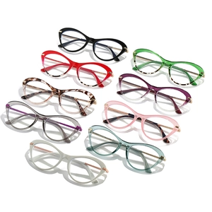 Collection of nine colorful cat-eye blue light blocking glasses for fashion women