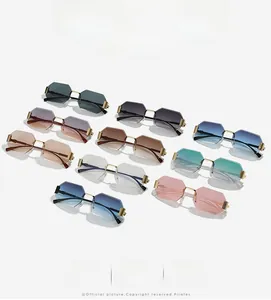 Collection of ten colorful rimless octagonal sunglasses with textured gold metal temples