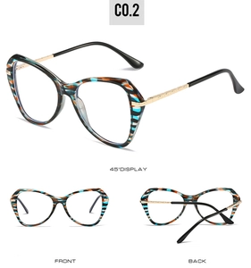 Detailed views of multi-colored tortoiseshell cat eye glasses with gold metal temples