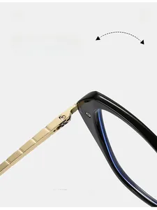 Detail of durable gold metal hinges and anti-blue light lens on black butterfly frames