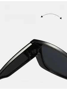 Detail view of the durable metal hinge construction on black cat-eye sunglasses