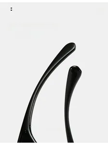 Detailed macro view showing the curved ergonomic temples of these black cat eye sunglasses