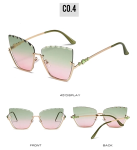 Detail view of cat-eye sunglasses with green pink gradient lenses and metal frames