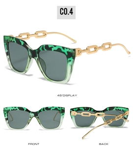 Detail of square oversized leopard print sunglasses with golden chain temples C0.4