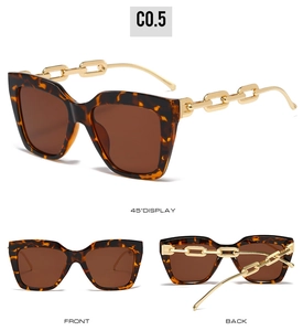 Detail view of tortoiseshell square sunglasses with decorative gold metal chain temples