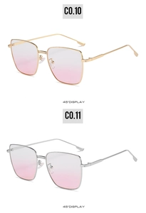 Detail view of square metal sunglasses in gold and silver with pink gradient lenses