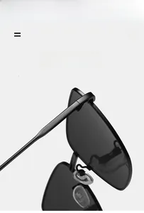 Detail showing high-quality metal hinges and soft silicone nose pads on black sunglasses