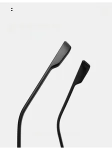 Macro detail of matte black curved ergonomic temples for comfortable eyewear fit