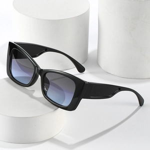 Fashionable black cat eye sunglasses with blue lenses and wide temples for women